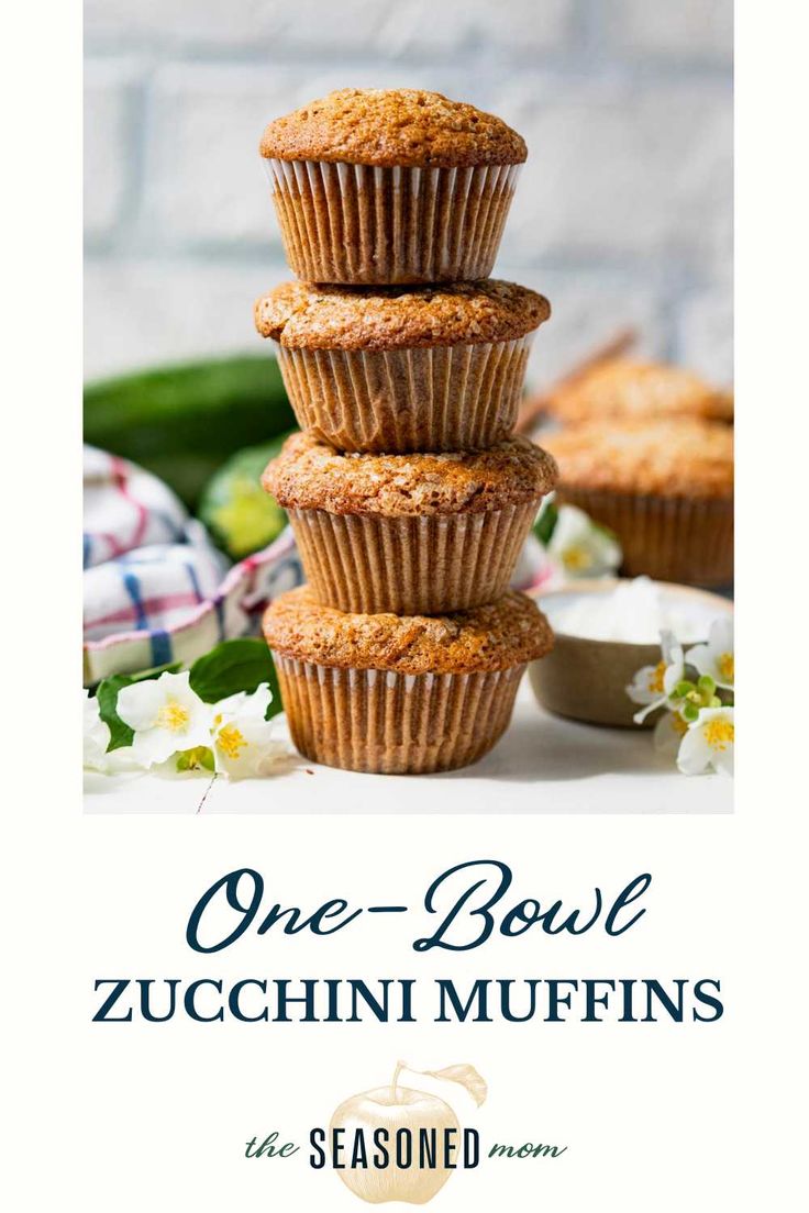 three muffins stacked on top of each other with the words one bowl zucchini muffins above them