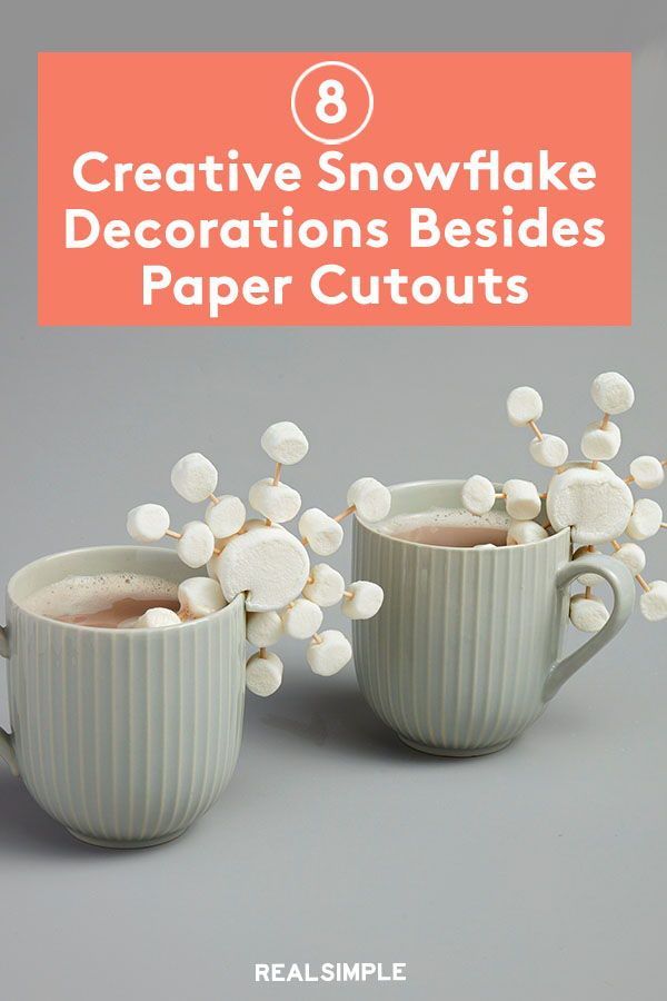 two cups with marshmallows in them and the words creative snowflake decorations besides