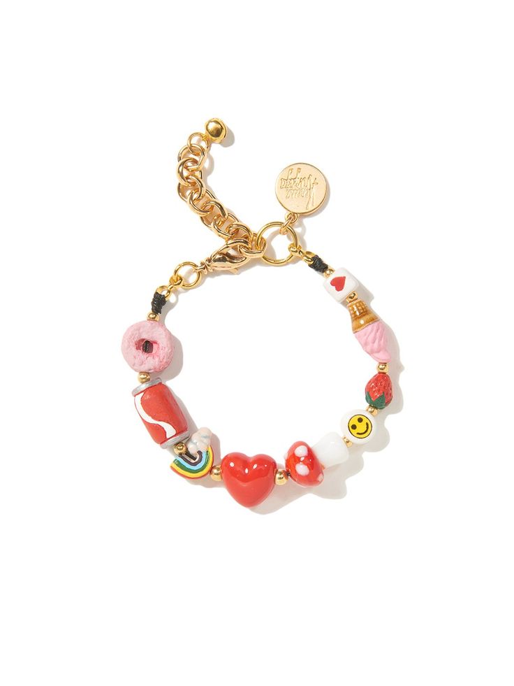 I'm a treat ❤️🍄🍓🍦 6" Ceramic and glass charm bracelet 1.5" extension Gold plated brass hardware Can be worn as an anklet. Please indicate ankle circumference measurement at checkout so we can make sure it fits as an anklet. Handmade in New York City. Due to the handmade nature of our products, some charms may vary in color and style or be replaced if unavailable. Please allow 5-7 business days for production. Word Bracelets, Ceramic Beads Bracelet, Candy Bracelet, Word Bracelet, Handmade Wire Jewelry, Funky Jewelry, Jewelry Lookbook, Cute Bracelets, Girly Jewelry