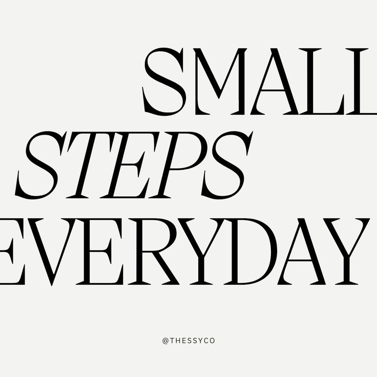 the words small steps everyday are black and white