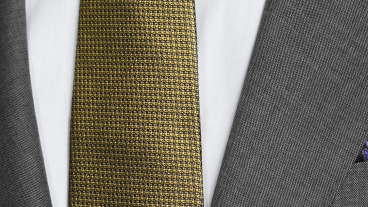 A classic light grey suit, refined to impress with its ultra-high-grade Super 150s fabric. This suit doesn’t need fancy patterns to earn respect, it does so with its subtleties of sophistication and quality. Functional sleeve buttons & half-canvas construction by default, full-canvas available in the additional options menu, when you click “Customize Now”. Elegant Gold Suits For Semi-formal Events, Elegant Gold Suits For Semi-formal Occasions, Elegant Gold Business Suits, Tailored Gray Suit And Tie Accessories For Formal Occasions, Elegant Tailored Gray Suit And Tie Accessories, Classic Gray Suits For Work, Tailored Gold Suit For Formal Occasions, Classic Gray Suit And Tie Accessories For Formal Events, Classic Gray Suit And Tie Accessories For Formal Occasions