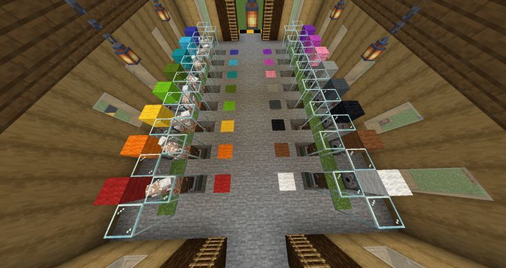 an aerial view of the inside of a building with multiple colored squares on each floor