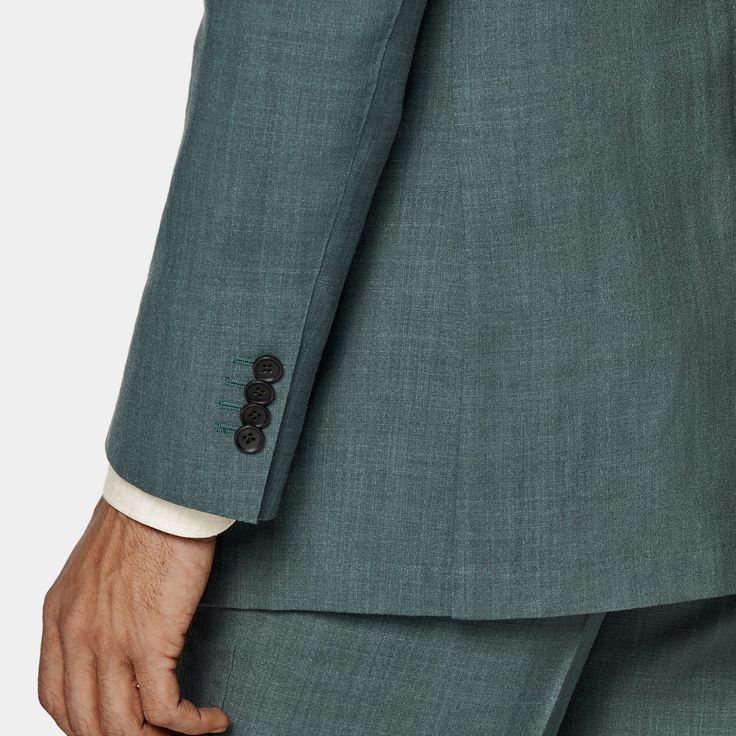 A sleek double-breasted suit in a muted green, this 6-button Havana is tailored to a slightly widened slim fit, bringing an updated touch to a timeless fit. Semi-formal Green Blazer With Double Button Closure, Green Tailored Double-breasted Blazer, Classic Green Three-piece Suit Single Breasted, Classic Green Three-piece Single Breasted Suit, Classic Green Single-breasted Three-piece Suit, Classic Green Three-piece Single-breasted Suit, Classic Green Three-piece Suit For Semi-formal Occasions, Classic Green Three-piece Suit With Notch Lapel, Classic Green Three-piece Suit For Business