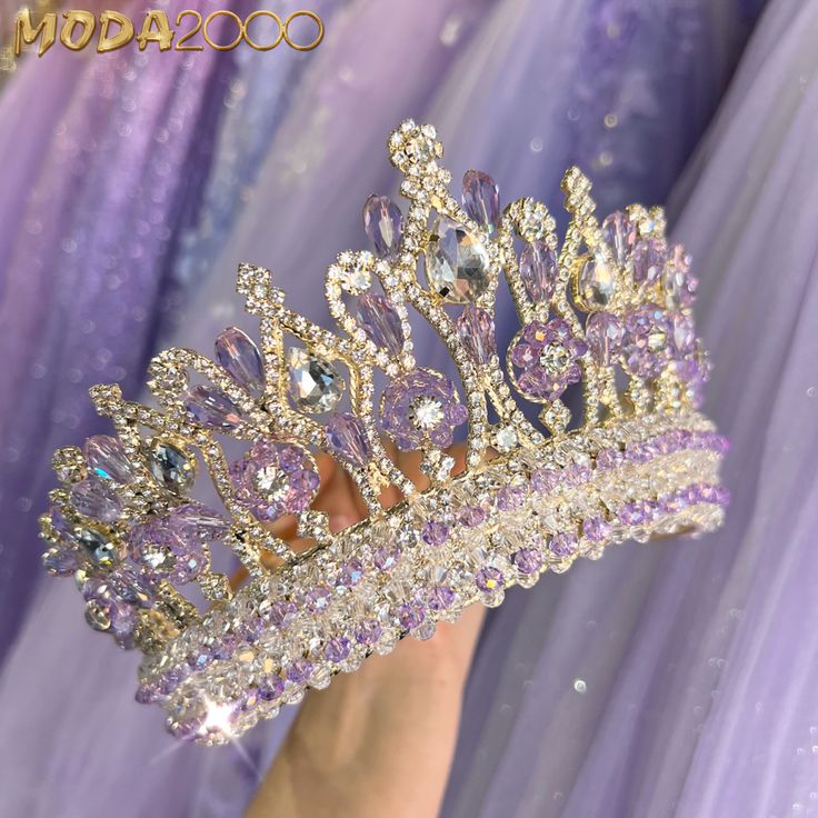 Made for Royalty👑 Which color would you wear? Shop our 𝗡𝗘𝗪 𝗖𝗥𝗢𝗪𝗡𝗦! + 𝘙𝘌𝘚𝘛𝘖𝘊𝘒!✨ PlanningMyQuince.com (shop on link) & in store at #Moda2000!🤍 Crowns For Quinceanera, Sweet 16 Crowns, Purple Quinceanera Theme, Quince Crowns, Quince Crown, Lavender Quinceanera Dresses, Lavender Quinceanera, Lavender Quince, Sweet 15 Party Ideas Quinceanera