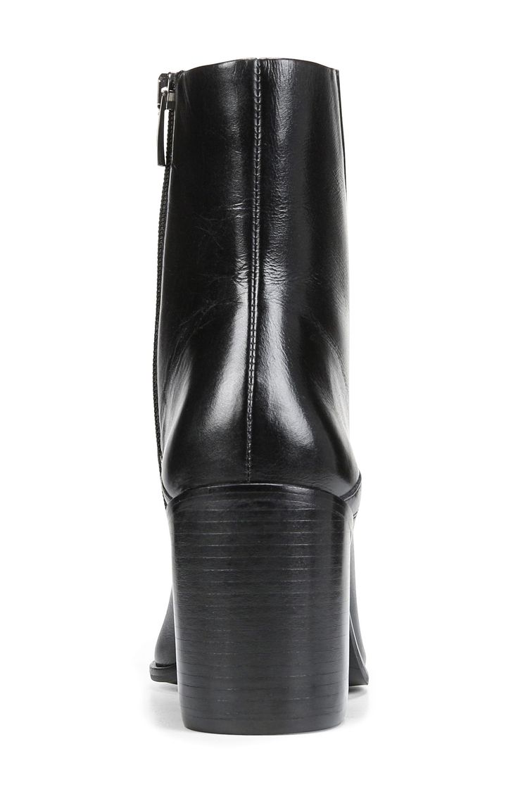 Asymmetric seams and tonal stitching amplify the modern appeal to a luxe leather bootie balanced by a pointy toe and stacked block heel. 3 1/4" heel 5 1/2" shaft Leather upper/synthetic lining and sole Made in Brazil Modern Fall Boots With Heel Pull Tab, Modern Boots With Heel Pull Tab For Fall, Trendy Leather Heeled Boots With Wide Calf, Trendy Wide Calf Leather Heeled Boots, Fall Platform Boots With Sculpted Heel For Work, Fall Workwear Platform Boots With Sculpted Heel, Modern Fall Platform Boots With Stacked Heel, Modern Platform Boots With Stacked Heel For Fall, Modern Boots With Reinforced Heel And Snip Toe