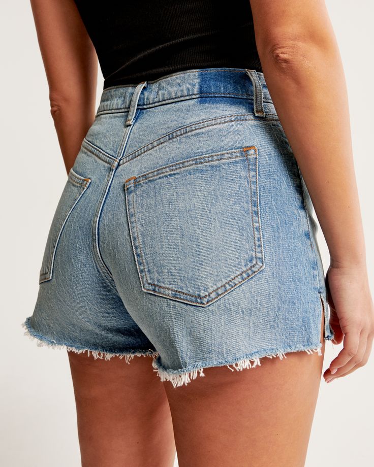 Embrace the summer with style in the Abercrombie & Fitch Women's Curve Love High Rise Mom Shorts. These shorts are designed specifically to flatter with a high-rise waist and a relaxed fit through the hip and thigh, ensuring no waist gap and optimum comfort.

- Size: 36
- Color: Light Medium Wash
- Material: Body - Cotton, Elastane; Pocket - Blend
- Gender: Female
- Inseam: 2.5 inches (6.25 cm)
- Features: Frayed hem, vintage stretch denim

Perfect for sunny days out or casual gatherings, these Relaxed Fit Shorts With 5-inch Inseam And Belt Loops, Spring Bottoms With Comfort Waistband, Short Length, Relaxed Fit Bottoms With Comfort Waistband, Short Length, Relaxed Fit Bottoms With Comfort Waistband, Fitted Cutoff Bottoms In Medium Wash, Mid-rise Bottoms With Comfort Waistband For Summer, Everyday Mid-rise Bottoms With Comfort Waistband, Everyday Bottoms With Comfort Waistband, Summer Bottoms With 5-inch Inseam And Belt Loops