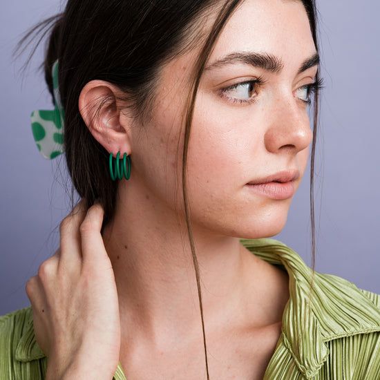 Zia Earrings | Larissa Loden | Matte Rubberized Slim Triple Hoops Green Earrings For Everyday, Modern Green Round Earrings, Modern Green Round Hoop Earrings, Everyday Green Circular Earrings, Modern Green Everyday Jewelry, Modern Green Hoop Earrings For Everyday Wear, Trendy Small Hoop Green Earrings, Trendy Small Hoop Earrings In Green, Trendy Green Hoop Earrings