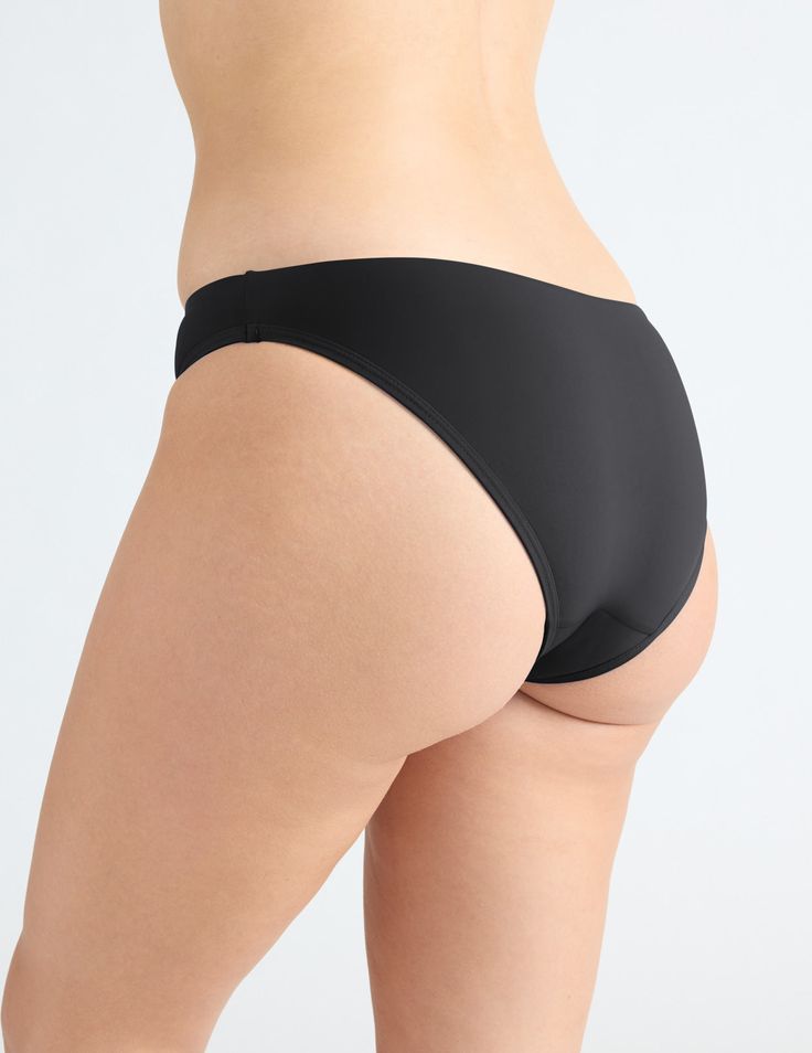 A classic cut and true swim collection staple. Medium butt coverage and fully lined UPF 50+ fabric. Plus get discreet, built-in protection against leaks. Absorbs about 1 regular tampon worth. | Knix Leakproof Bikini Underwear Swim Bottom in Black Supportive Full Coverage Swimwear Shapewear, Full Coverage Elastane Swimwear With Lined Body, Black Smoothing Shapewear Swimwear, Full Coverage Stretch Swimwear With Lined Body, Classic Stretch Swimwear With Moderate Back Coverage, Sleek Swimwear With Moderate Back Coverage, Elastane, Classic Stretch Swimwear For Beach, Black Tankini With Moderate Back Coverage For Pool, Sleek Smoothing Brief Swimwear