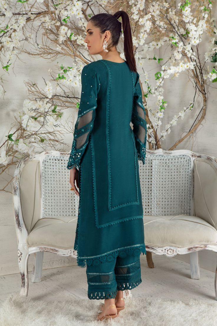 Stylish and trendy this mono tone silk net ensemble is a must have this Eid season, adorned with silk thread embroidery enhance with sequins, beads, pearls and stunning glitzy mirror details to accentuate the entire look, lace composed panels and bead tassel completes this look, paired with lace detailed culottes, mirror, pearl and lace embellished chiffon dupatta to uplift your day or night look. Shirt Fabric: Pure Silk Net Shirt Length: 45” cullotes Fabric: Khaadi Silk Dupatta Fabric: Pure Chi Silk Thread Embroidery, Net Shirt, Designer Outfit, Pure Chiffon, Pearl And Lace, Chiffon Dupatta, Pakistani Designers, Thread Embroidery, Silk Dupatta