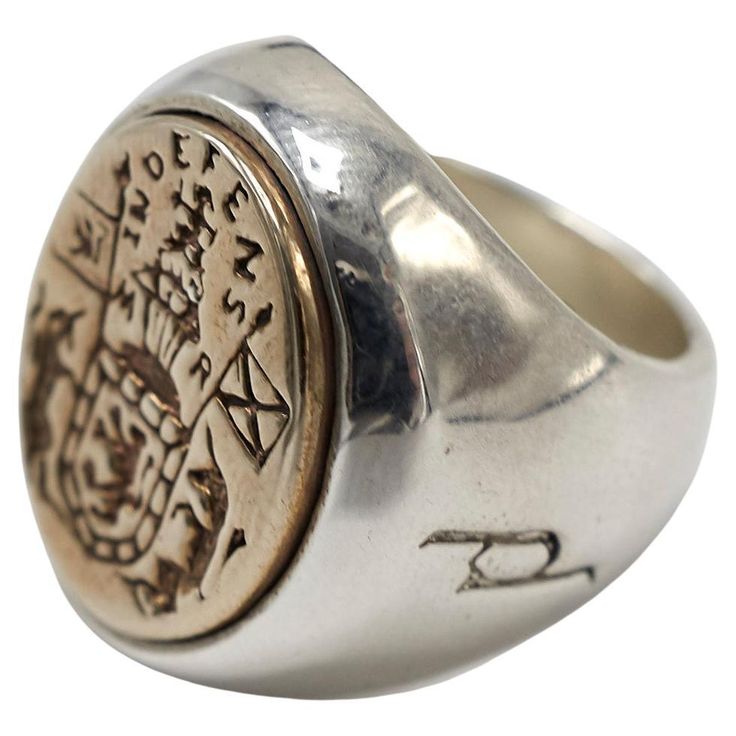 Crest Signet Ring 14k White Gold 14k Yellow Gold Unisex J Dauphin Inspired by Queen Mary of Scots ring. Gold signet-ring; engraved; shoulders ornamented with flowers and leaves. Oval bezel set with silver intaglio depicting achievement of Mary Queen of Scots: shield of Scotland surrounded by collar of thistle, supported by two unicorns; crest: crowned lion sejant affronté holding sword; dexter: banner with arms of Scotland; sinister: flag with three bars over saltire. Inscribed with a monogram s Queen Mary Of Scots, Mary Of Scots, Lion Unicorn, Two Unicorns, Wax Seal Ring, Lion And Unicorn, Mary Queen Of Scots, Story Board, Gold Signet Ring