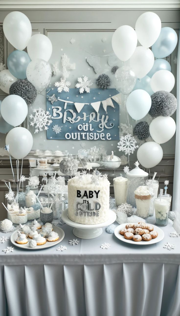 a baby shower party with balloons, cake and desserts