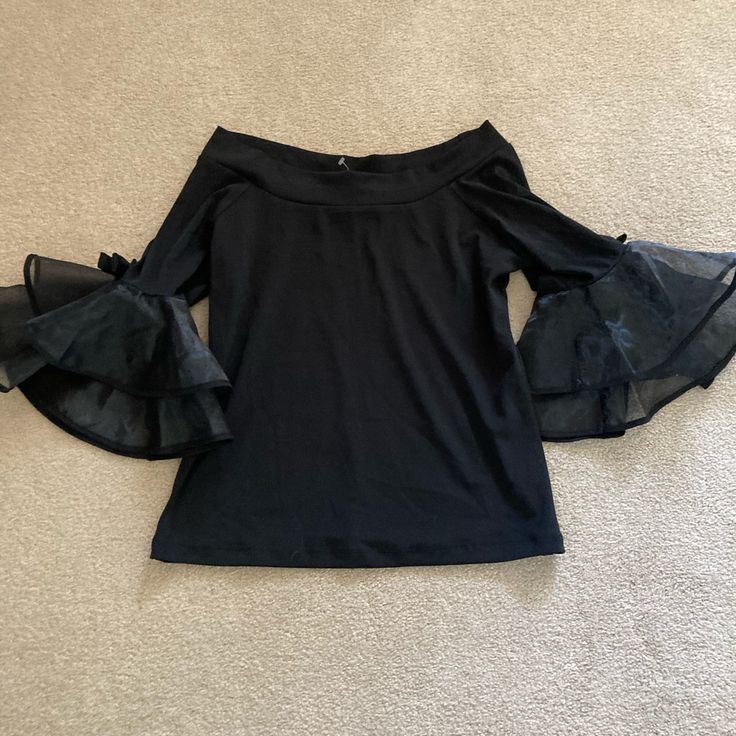 Gorgeous Classy Black Top With Nylon Sleeves And Bow Detail, Perfect With Jeans Or A Skirt Nwot Trendy Black Stretch Blouse, Black Stretch Blouse For Night Out, Black Stretch Blouse With Ruffles, Stretch Black Blouse With Ruffles, Tops Black, A Skirt, Bow Detail, Black Top, Womens Tops