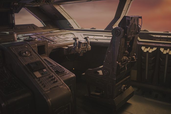 the interior of an airplane with many electronic devices