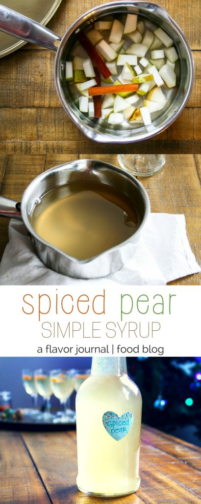 a bottle of liquid sitting on top of a wooden table next to a pan filled with food