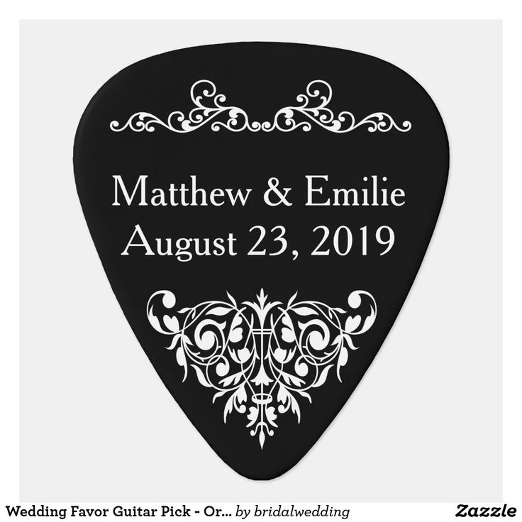 a black guitar pick with the words, wedding favors and date printed on it's side