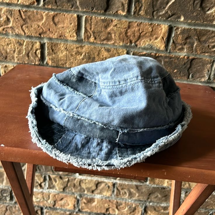 Size All Spring Washed Blue Cotton Hat, Casual Blue Bucket Hat One Size, Blue Flat Brim Bucket Hat One Size, Blue Casual Bucket Hat With Curved Brim, Casual Blue Bucket Hat With Curved Brim, Blue Flat Brim Bucket Hat, Casual Blue Wide Brim Bucket Hat, Casual Blue Sun Hat With Short Brim, Casual Distressed Flat Brim Hats