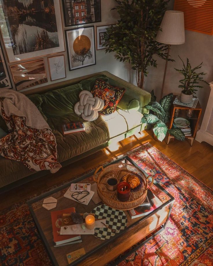 a living room filled with lots of furniture and pictures on the wall above it's coffee table