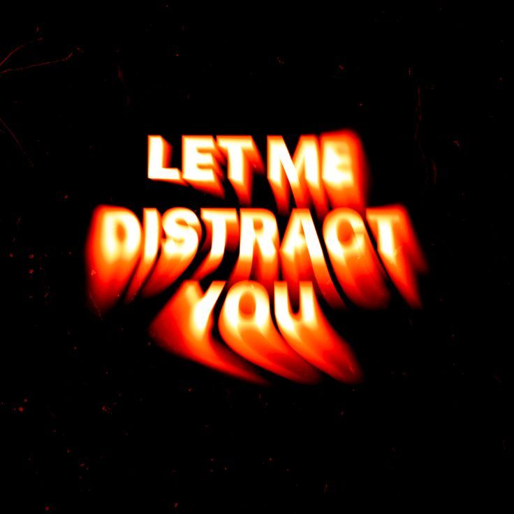 the words let me distract you are lit up in red and orange colors on a black background