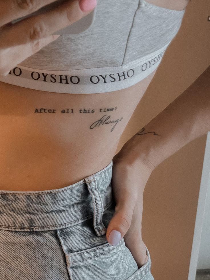 a woman's lower back with tattoos on her stomach and the words, o osho oxygen