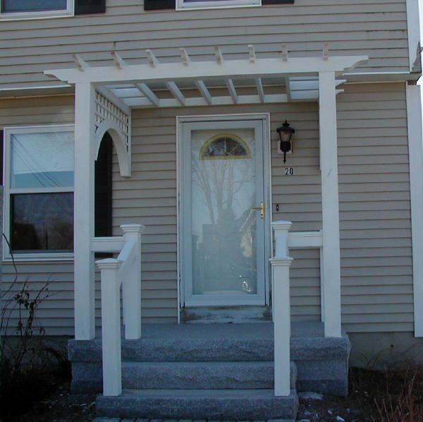 a house with a white front door and porch