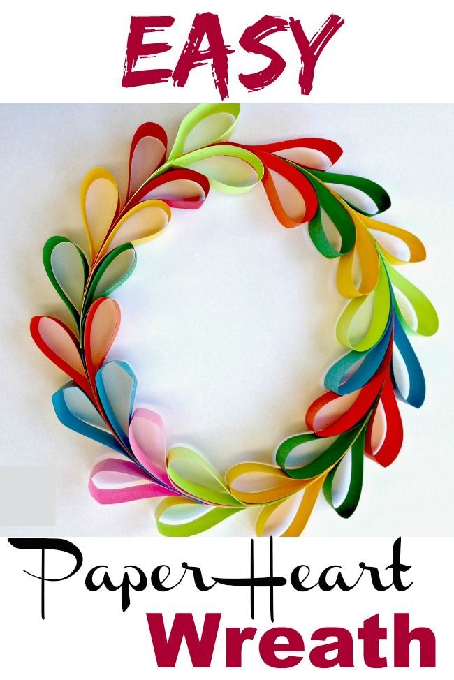 paper heart wreath with text overlay that says easy paper heart wreath on white background