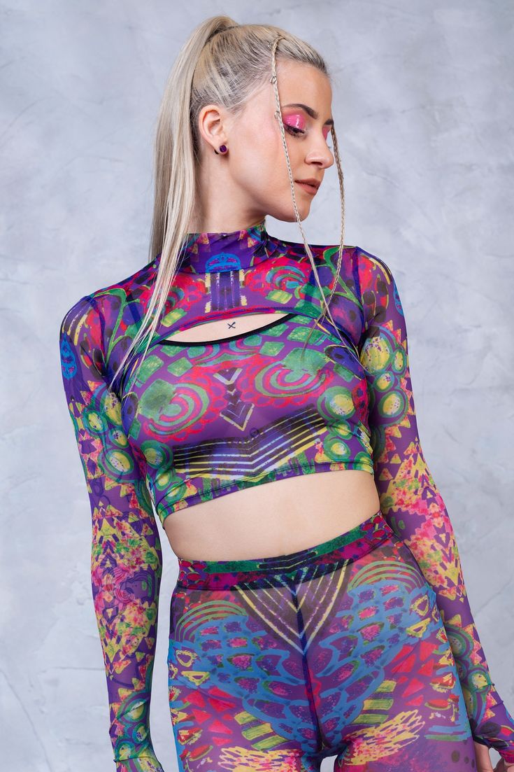 $44 Fitted Long Sleeve Rave Top, Fitted Long Sleeve Mesh Top For Festival, Stretch Multicolor Top For Yoga, Multicolor Stretch Top For Yoga, Stretch Multicolor Yoga Top, Stretch Rave Tops For Spring, Stretch Purple Top For Festival, Stretch Purple Tops For Festival, Stretch Top For Spring Rave