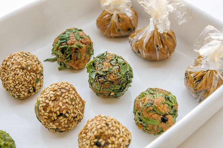 several balls of food on a white tray