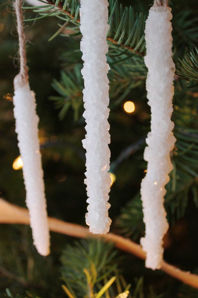 some white icicles hanging from a christmas tree