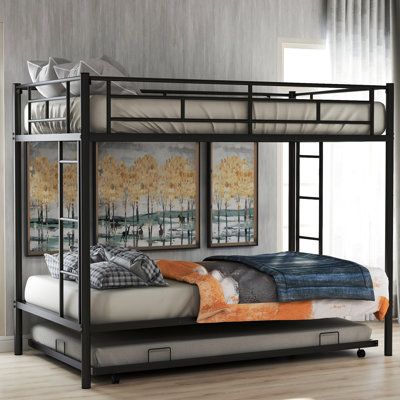 a metal bunk bed sitting in a bedroom next to a wall with pictures on it