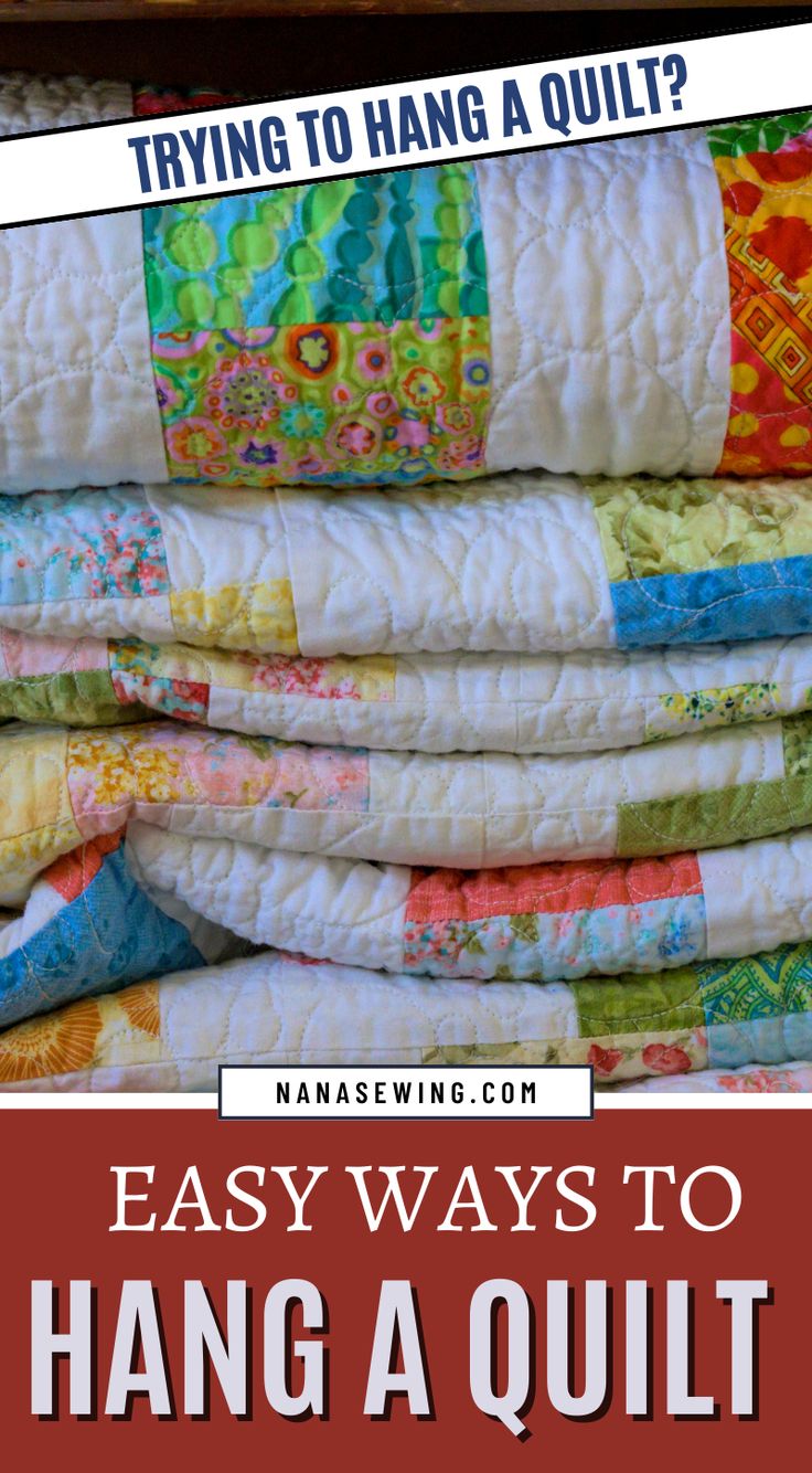 a pile of quilts with text overlay that reads, trying to hang a quilt?