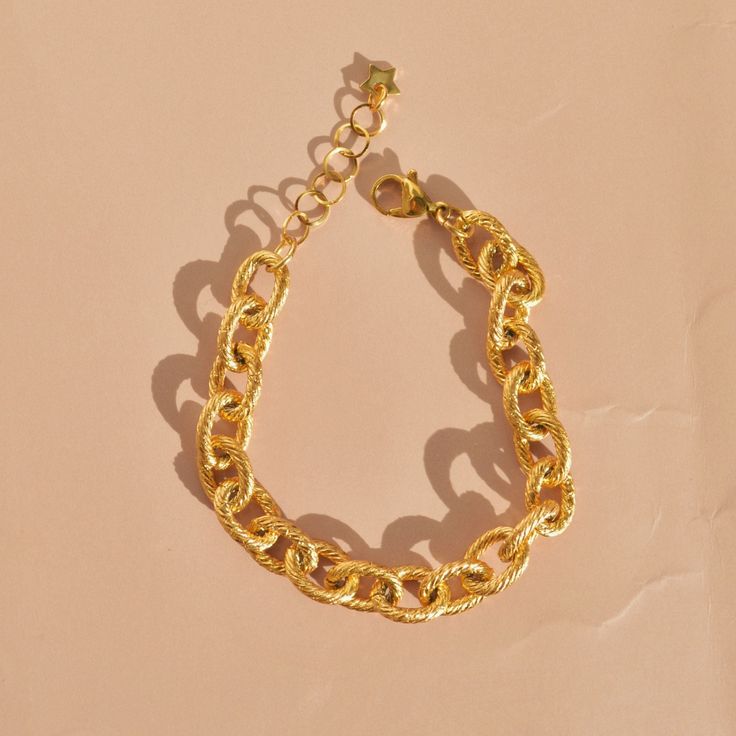 The slightly chunky chain design makes it so chic, that you can wear it alone for an effortless look or you can stack it with other bracelets from our store! Final Sale Items can't be returnedDETAILS:Water Resistant Material: 18k gold layer over stainless steelLengths: 6 inches, 7 inches + 1 inch of adjustable extender chain Chain Design, Sale Items, 6 Inches, Final Sale, 1 Inch, 18k Gold, Water Resistant, Bracelet, Chain