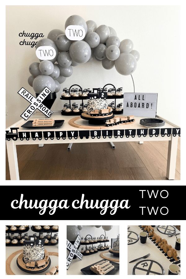 a table topped with lots of silver and black balloons next to a sign that says chuga chuga two