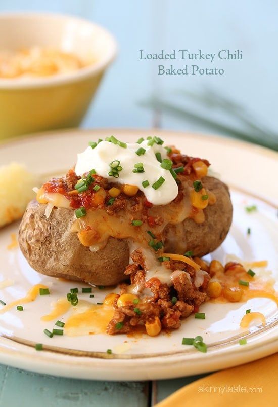 loaded turkey chili baked potato on a plate