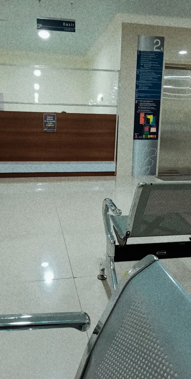 an empty luggage carousel at the airport