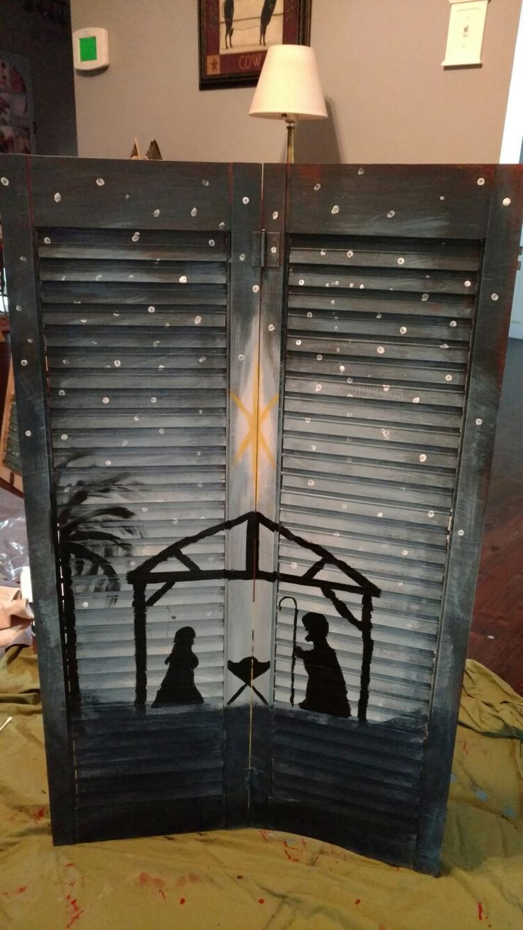 an image of a nativity scene with the birth of jesus and mary in silhouette