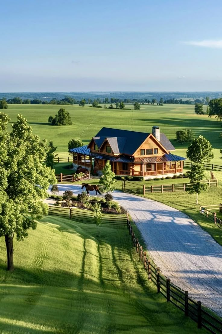 an aerial view of a large farm house