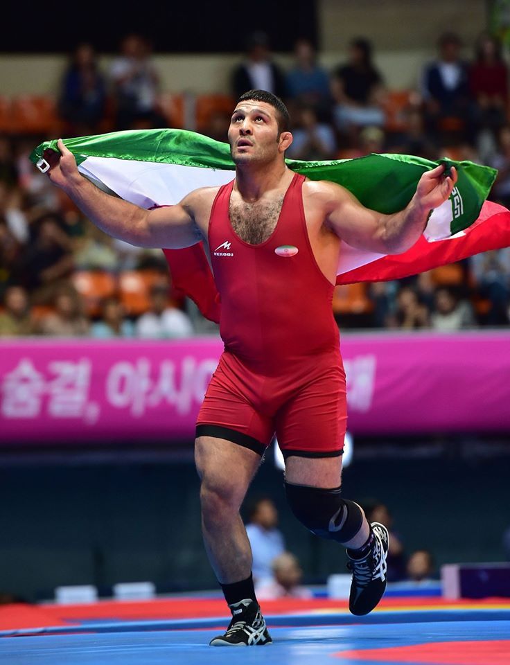 Iranian wrestler Reza Yazdani has bagged a gold medal in the men's freestyle 97-kilogram wrestling at the 2014 Asian Games. Reza Yazdani, Sports Mix, Wrestling Singlet, Asian Games, Water Polo, Gold Medal, Mens Fitness, Volleyball, Wrestling