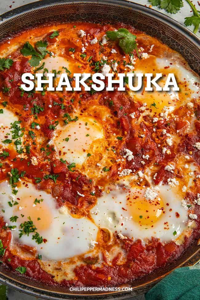 an egg dish in a skillet with the words shakshuka above it