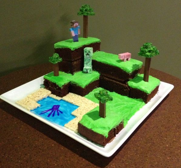 a cake made to look like an island with trees and people on it, sitting on a table