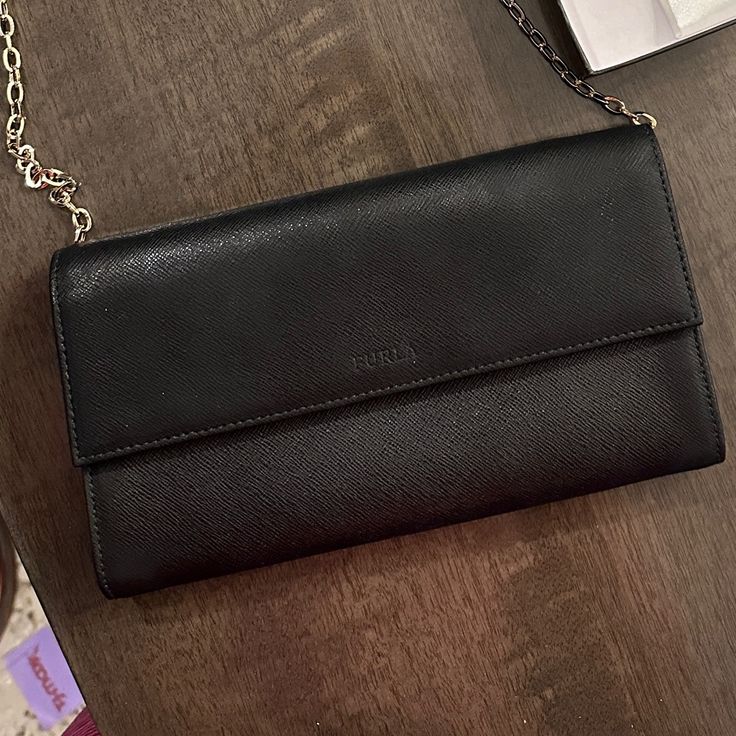 Furla Wallet In Chain, Can Be Used As Clutch Or Shoulder Bag. Excellent Condition. Comes With Original Box And Dust Cover. Formal Black Shoulder Bag With Card Slots, Black Wallet On Chain For Everyday, Elegant Wallet On Chain For Daily Use, Formal Black Wallet On Chain With Removable Pouch, Elegant Wallets With Chain Strap For Gift, Chic Black Wallet On Chain For Everyday Use, Elegant Wallet With Chain Strap As Gift, Chic Wallets With Chain Strap For Daily Use, Rectangular Wallets With Chain Strap For Everyday Use