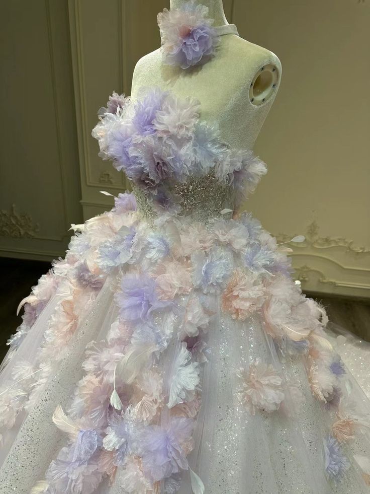 a dress made out of white and pink flowers