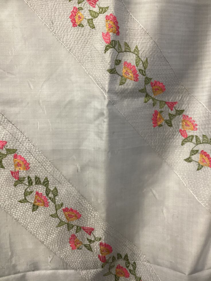 Traditional craft of Bengal with running stitches all over the whole surface of the textiles. The women used to quilt old white saree's together to make shawls, bed covers etc using the colourful border threads to decorate them. This shawl is 100% silk and silk lined With the entire surface stitched nakshi kantha style all over.   90 cm x 212 long ( 190 m2 ) Unstitched Jamawar Fabric With Embroidered Border, Bohemian Jamawar Handloom Dupatta, Festive White Pashmina Shawl With Motifs, Festive Off-white Handloom Dupatta, White Pashmina Shawl Dupatta For Festive Occasions, White Pashmina Dupatta For Festive Occasions, Bohemian Off White Dupatta For Festive Occasions, Traditional Embroidered Shawl With Motifs, Traditional White Pashmina Shawl With Resham Embroidery