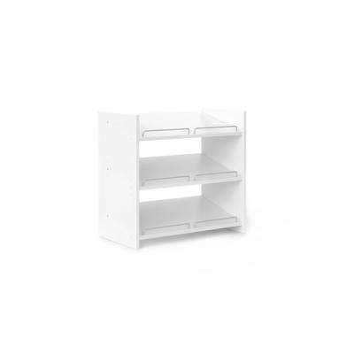 a white shelf with two open shelves on each side and one closed drawer in the middle