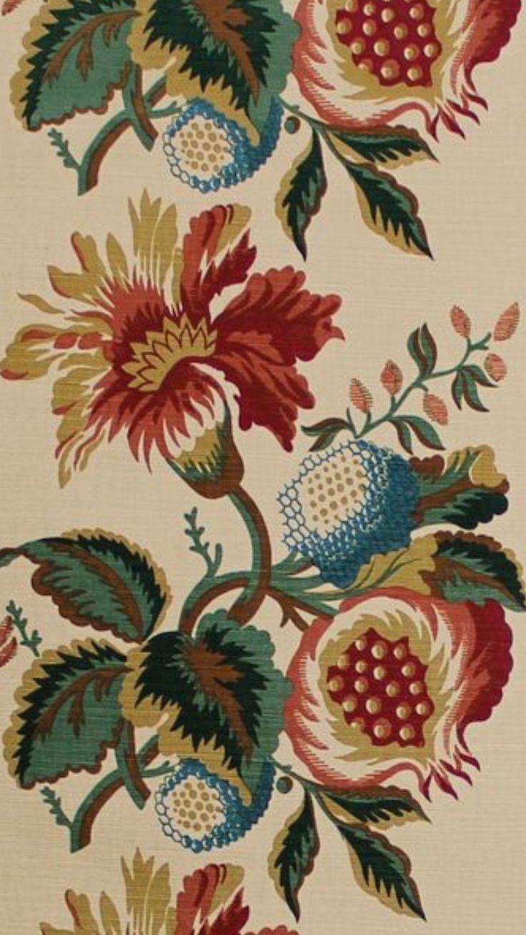 an old rug with flowers and leaves on it