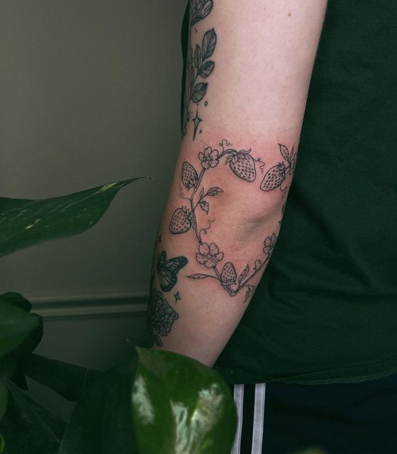 a person with a tattoo on their arm