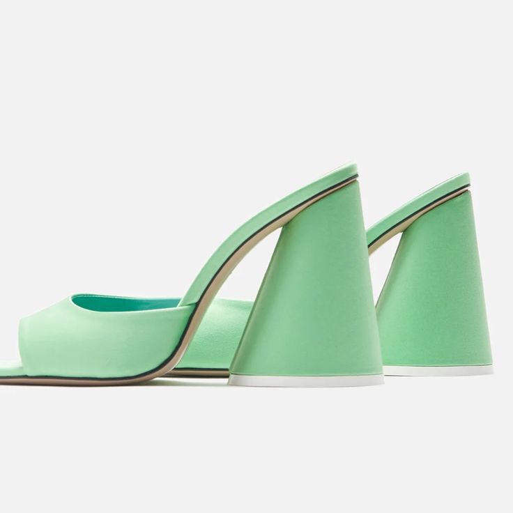 As With Any Footwear From The Attico, The Luz Mules Make A Glamorous Statement. Made From Mint Green Satin With Rounded Toes, They Are Defined By Signature Conical Block Heels. Comes With A Box Lining: Leather Made In Italy Sole: Leather Insole And Sole Toe Shape: Square Open Toe Upper: Fabric Tiny Imperfection On Inside Of One Show. See Pic, Barely Noticeable. Modern Green Open Heel Heels, Green Open Heel Evening Heels, Modern Green Heels With Contrasting Heel Counter, Green Heels With Deep Heel Cup For Summer, Green Heels With Contrasting Heel Counter For Spring, Spring Green Heels With Contrasting Heel Counter, Green Closed Toe Heels With Contrasting Heel Counter, Green Heels With Contrasting Heel Counter For Party, Green Pointed Toe Luxury Heels