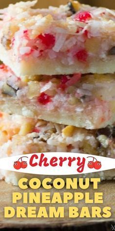 three pieces of coconut pineapple dream bars stacked on top of each other with the title cherry coconut pineapple dream bars