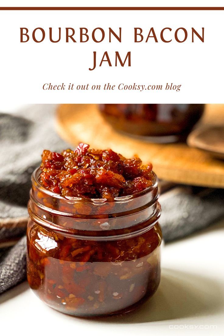 bourbon bacon jam in a glass jar on a white surface with text overlay that reads bourbon bacon jam check it out on the cooksy com blog