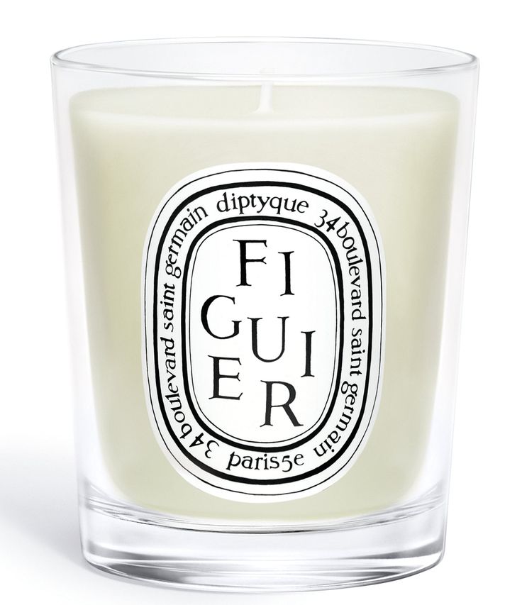 a candle that is sitting in front of a white background with the words figuer on it