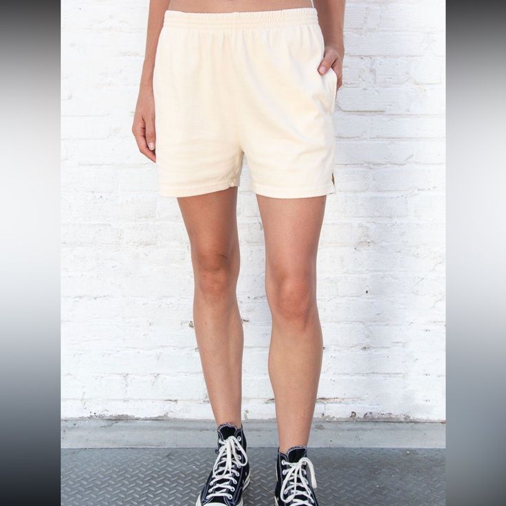 Soft Cotton Sweatshorts With Side Pockets And An Elastic Waistband. Fabrics: 100% Cotton Measurement: 19" (35 Cm) Rise, 7" (9 Cm) Inseam, 28" (71 Cm) Waist Made In: Italy Relaxed Fit Athletic Shorts For Spring, Relaxed Fit Athletic Shorts With Elastic Waistband For Spring, Athleisure Pajama Shorts For Summer, Casual Athletic Shorts For Day Out, Trendy Relaxed Fit Athletic Shorts For Spring, White Athletic Shorts For Spring, Sporty Jean Shorts For Summer, Sporty Short Bottoms For Spring, White Knee-length Athletic Shorts For Spring